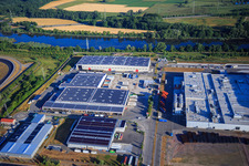 Oblique view of Oberwald industrial area with WAS Logistics, Com Transporte GmbH and NUSS Group in Wörth am Rhein in the state Rhineland-Palatinate, Germany