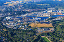 Aerial photograpy of Verkehrs Betriebe Karlsruhe GmbH - Depot West and Windpark Deponie West (Energieberg) in front of the Karlsruhe Rhine ports from the north in the district Knielingen in Karlsruhe in the state Baden-Wuerttemberg, Germany