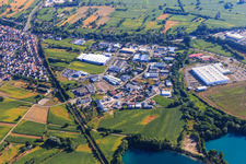 Industrial area Industriestraße from the south with OFTEC Oberflächentechnik GmbH & Co. KG and Faurecia Interieur Systeme GmbH in Hagenbach in the state Rhineland-Palatinate, Germany