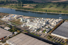 Aerial view of Building and production halls on the premises of the chemical manufacturers Grace GmbH on the river bank of the Rhine in Worms in the state Rhineland-Palatinate, Germany