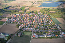 Village - view on the edge of agricultural fields and farmland in Wattenheim in the state Hesse, Germany