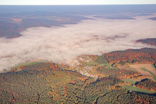 Aerial photograpy of View of the town under morning mist in the district Erlenbach in Erbach in the state Hesse, Germany
