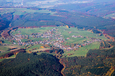 Aerial photograpy of Village - view on the edge of agricultural fields and farmland in Wuerzberg in the state Hesse, Germany