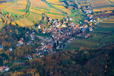 Wine-growing town from the west in autumn leaves in Leinsweiler in the state Rhineland-Palatinate, Germany