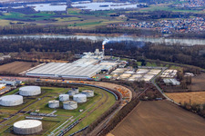 Industrial area at the airport with tank farm and Saint-Gobain Isover G+H AG in Speyer in the state Rhineland-Palatinate, Germany