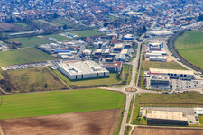 Industrial area in the Speyer Valley with ITK Engineering GmbH, TRANSAC International Shipping Company Ltd., and DBK David + Baader GmbH in Rülzheim in the state Rhineland-Palatinate, Germany