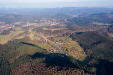 Village - view on the edge of agricultural fields and farmland in Rumbach in the state Rhineland-Palatinate, Germany