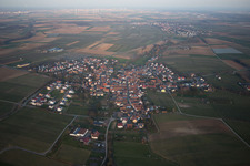Village - view on the edge of agricultural fields and farmland in Impflingen in the state Rhineland-Palatinate, Germany