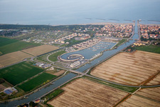 Pleasure boat marina with docks and moorings on the shore area Marina di Porto Reno in Casalborsetti in Emilia-Romagna, Italy