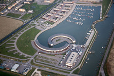 Aerial photograpy of Pleasure boat marina with docks and moorings on the shore area Marina di Porto Reno in Casalborsetti in Emilia-Romagna, Italy