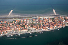 Townscape on the seacoast of Mediterranean Sea in San Vito in Veneto, Italy seen from above