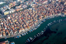 Aerial view of Port facilities on the seashore of the Lagune von Venedig in the district Sottomarina in Chioggia in Veneto, Italy