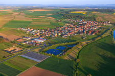 Village view on the banks of the Main from the north in the district Stammheim in Kolitzheim in the state Bavaria, Germany