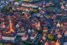 Old town with St. Bartholomew and Thieves' Tower in Volkach in the state Bavaria, Germany