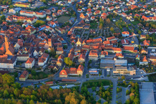Aerial view of Old town with St. Bartholomew and Thieves' Tower in Volkach in the state Bavaria, Germany