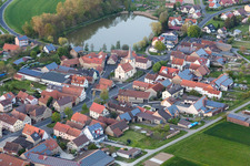 Village on the lake bank areas of Voegniter Sees in the district Moenchstockheim in Sulzheim in the state Bavaria, Germany