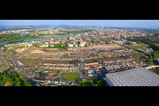 Panoramic view of the chemical plant BASF on the Rhine riverbank from the north, including freight yard and warehouse. in the district BASF in Ludwigshafen am Rhein in the state Rhineland-Palatinate, Germany