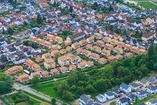 Malvenweg residential area with ochre-colored tiled roofs in Lorsch in the state Hesse, Germany
