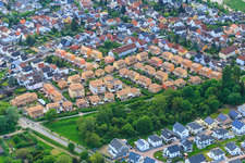 Aerial view of Malvenweg residential area with ochre-colored tiled roofs in Lorsch in the state Hesse, Germany