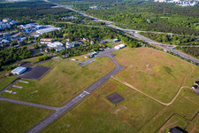 Runway with tarmac terrain of airfield August-Euler-Flugplatz in Griesheim in the state Hesse, Germany