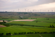 Wind turbine windmills on a hill in Gau-Odernheim in the state Rhineland-Palatinate