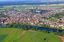City overview on the banks of the Main from the northeast with monastery garden Seligenstadt in Seligenstadt in the state Hesse, Germany
