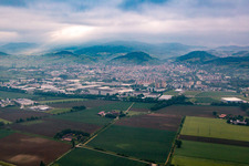 Aerial view of Mountains on the edge of the Odenwald in morning mist in Heppenheim in the state Hesse, Germany
