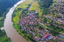 Village view on the banks of the Main from the west in the district Eichel in Wertheim in the state Baden-Wuerttemberg, Germany