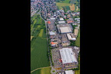 Commercial area south of the B27 with REWE Center and Motorradhaus Ebert eK in Höchberg in the state Bavaria, Germany