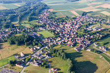 Village - view on the edge of agricultural fields and farmland in Riedseltz in Grand Est, France