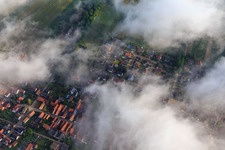 Aerial photograpy of Wolfgangsgang Church under clouds in Freckenfeld in the state Rhineland-Palatinate, Germany