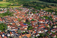 Mühlstraße and Catholic Church of St. George in Venningen in the state Rhineland-Palatinate, Germany