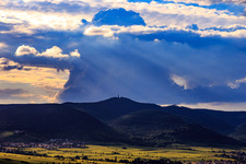 Cumulonimbus thundercloud over the summit of the Kalmit in Maikammer in the state Rhineland-Palatinate, Germany
