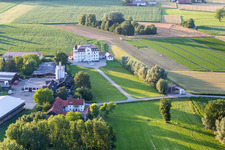 Aerial view of Buildings and parks at the mansion of the farmhouse Plankenschwaige in Landau an der Isar in the state Bavaria, Germany