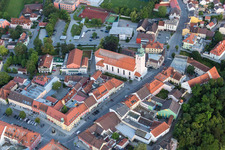 Aerial view of Church building in of Stadtpfarrkirche St . Maria Old Town- center of downtown in Landau an der Isar in the state Bavaria, Germany