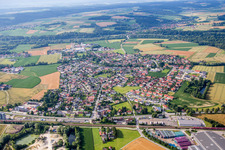 Village - view on the edge of agricultural fields and farmland in the district Kronwieden in Loiching in the state Bavaria, Germany