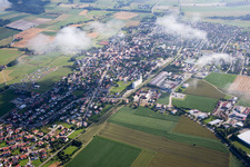 Aerial photograpy of Town View of the streets and houses below clouds of the residential areas in Geiselhoering in the state Bavaria