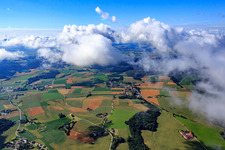 Aerial view of Village view from the north under clouds in the district Hofdorf in Mengkofen in the state Bavaria, Germany
