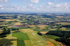 Village - view on the edge of agricultural fields and farmland in Mengkofen in the state Bavaria, Germany