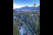 Balloon over the river Jachen in the district Fleck in Lenggries in the state Bavaria, Germany