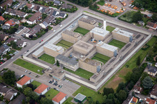 Surrounded by security fence premises of jail Justizvollzugsanstalt Frankenthal in Frankenthal (Pfalz) in the state Rhineland-Palatinate, Germany