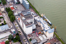 Building and production halls on the premises of the chemical manufacturers Trumpler GmbH & Co. KG, Chemische Fabrik on the river banks of the Rhine in Worms in the state Rhineland-Palatinate, Germany