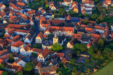 Village center with parish church in Kerzenheim in the state Rhineland-Palatinate, Germany