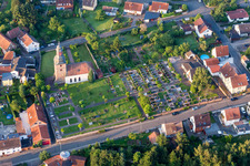 Grave rows on the grounds of the cemetery near the church in Sippersfeld in the state Rhineland-Palatinate, Germany
