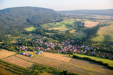 Village - view on the edge of agricultural fields and farmland in Jakobsweiler in the state Rhineland-Palatinate, Germany
