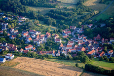 Aerial view of Village - view on the edge of agricultural fields and farmland in Jakobsweiler in the state Rhineland-Palatinate, Germany