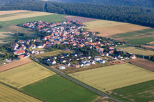 Aerial view of Village - view on the edge of agricultural fields and farmland in Orbis in the state Rhineland-Palatinate, Germany
