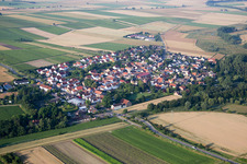 Village - view on the edge of agricultural fields and farmland in Friesenheim in the state Rhineland-Palatinate, Germany