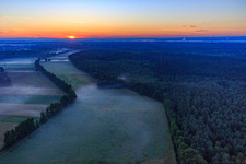 Aerial view of Sunrise in the Otterbachtal with morning mist in Kandel in the state Rhineland-Palatinate, Germany