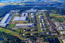 Industrial area at the airport with tank farm of TanQuid, warehouses of Lidl Vertriebs GmbH & Co. KG and Samsung SDS in Speyer in the state Rhineland-Palatinate, Germany
